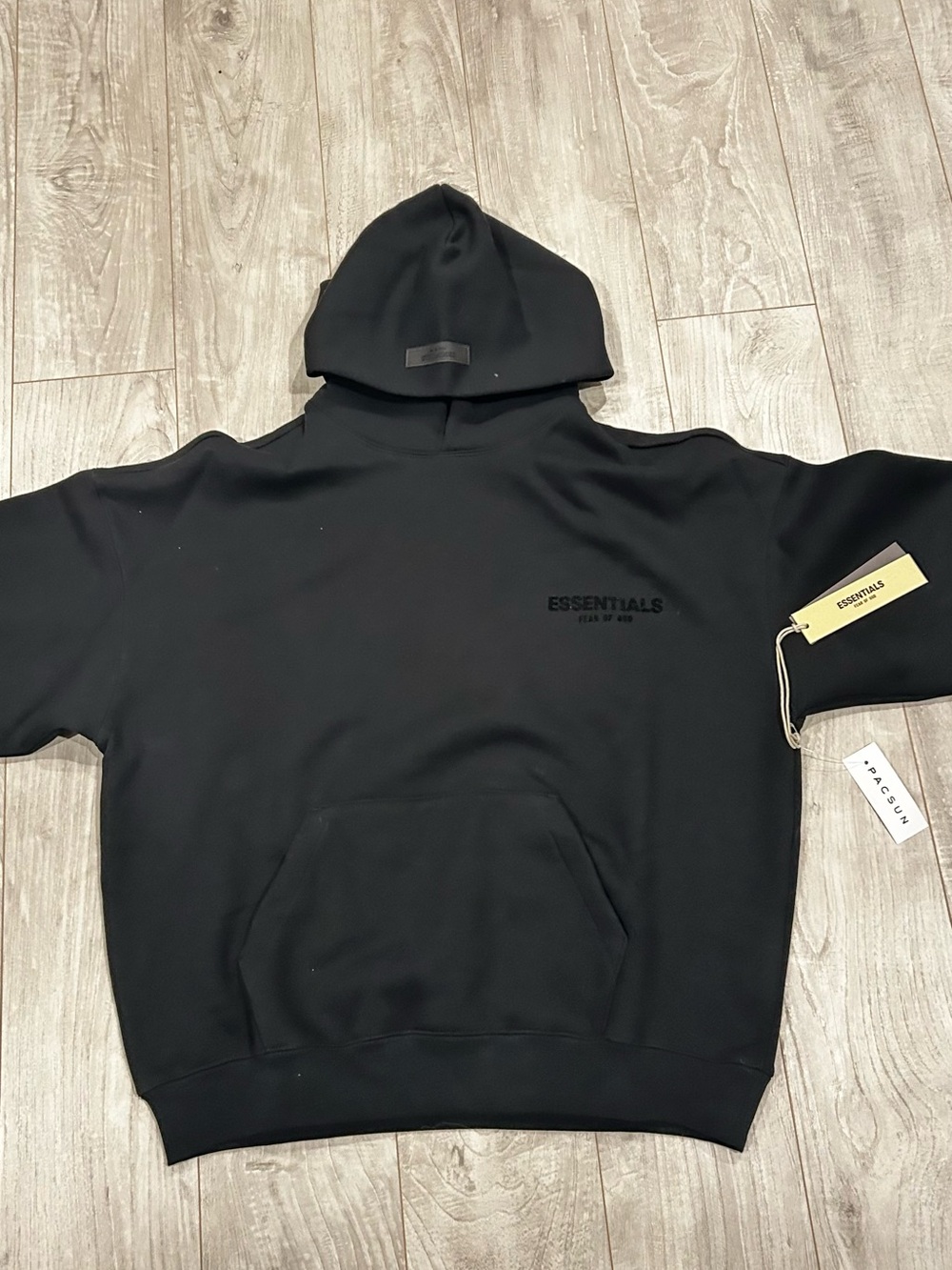 ESSENTIALS Black Hoodie with Subtle Front Logo
